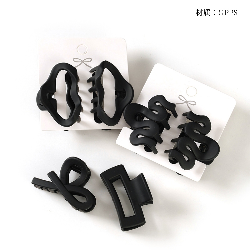 Bolsillo Negro Con Forma de Claw Medio 2