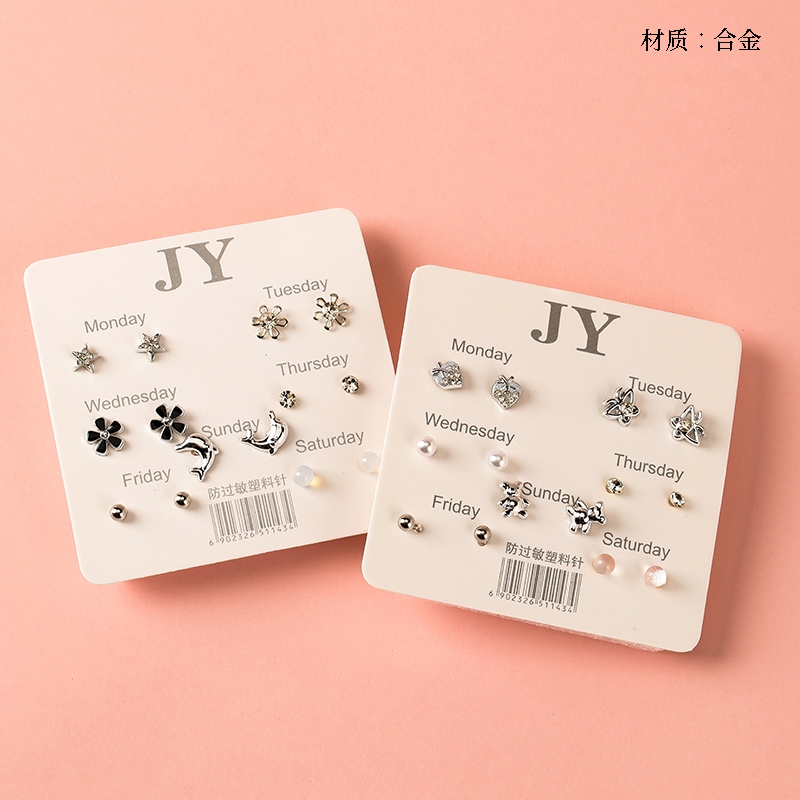 Siete Pares de Pendientes de Diamante Combinación de Plata