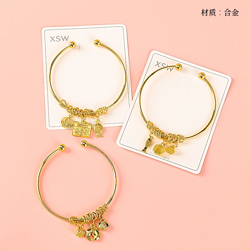 Gold Tag Coiled Open Bracelet 2
