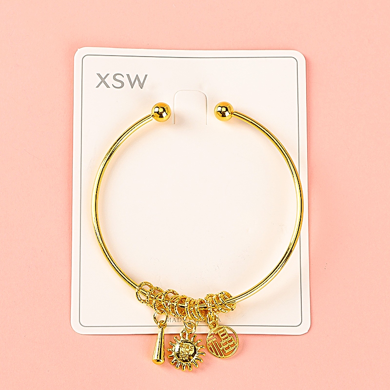 Gold Tag Coiled Open Bracelet 3