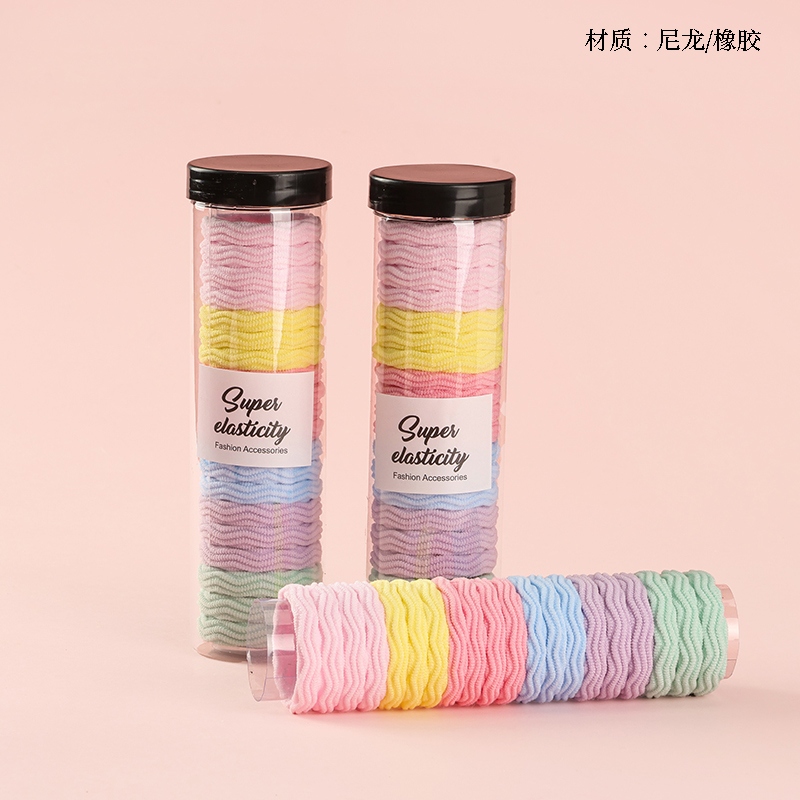 Veinte Bandas de Goma Jacquard de Colores En un Tubo