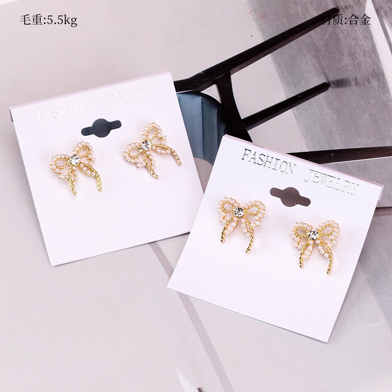 Rice Beads Zircon Arco Pendientes de Corbata