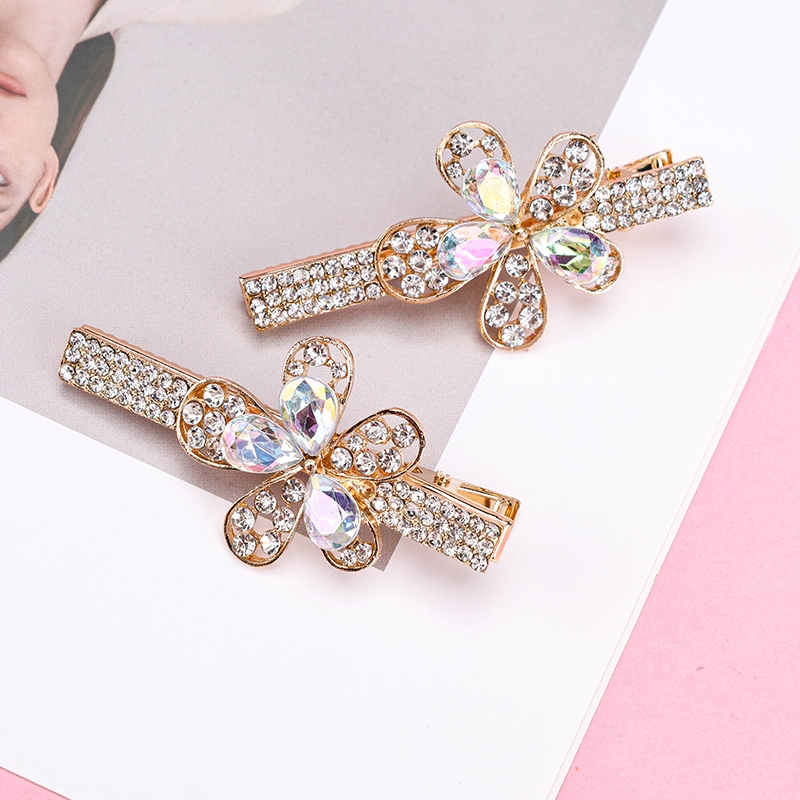 Bagged Zircon Flor Clip 3
