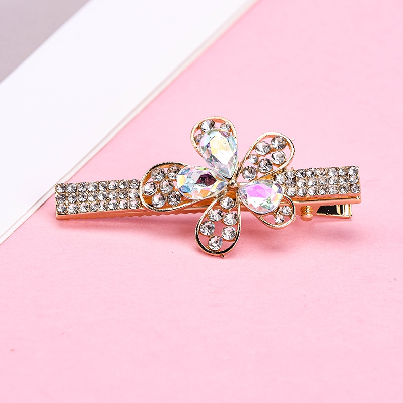 Bagged Zircon Flor Clip 4