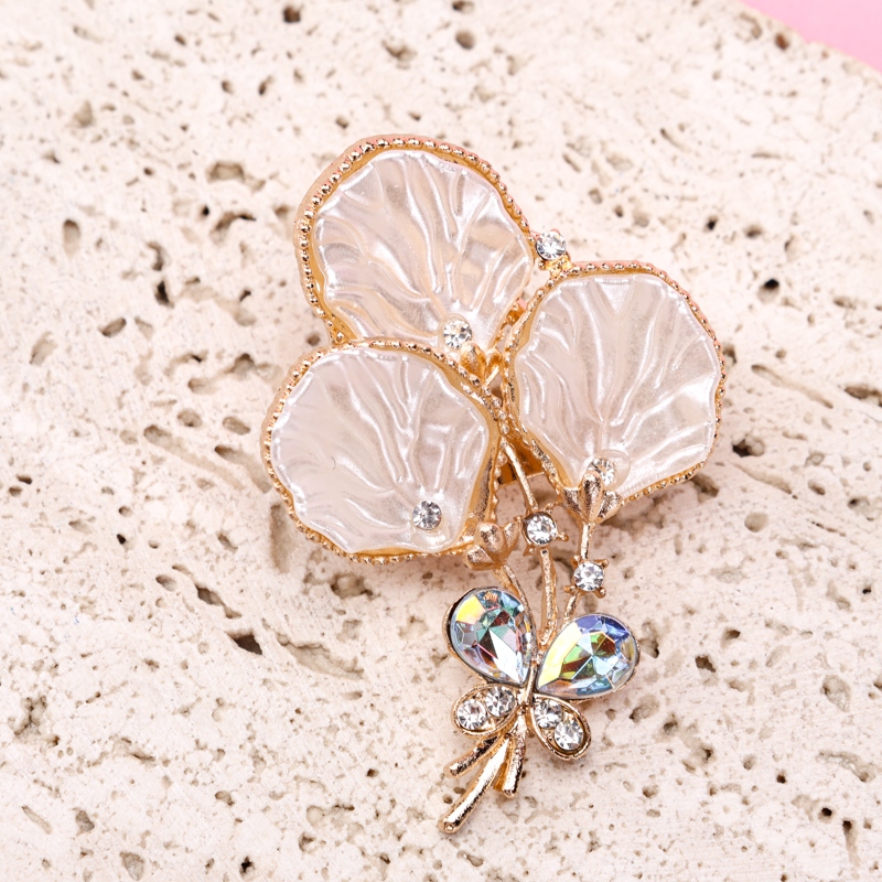 Broche de Mantequilla de Zircon 3