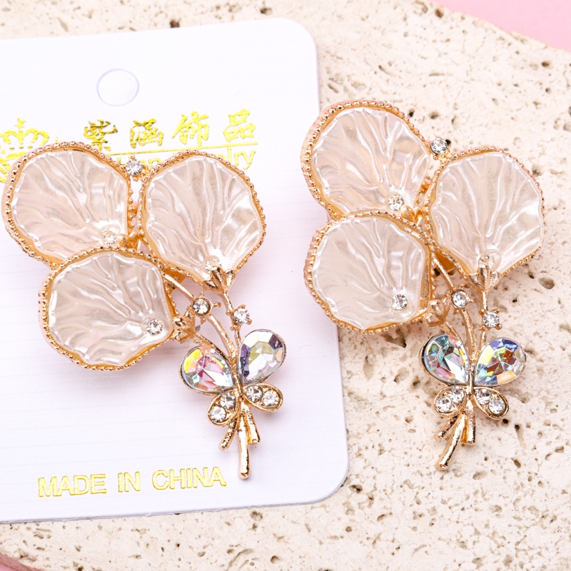 Broche de Mantequilla de Zircon 4