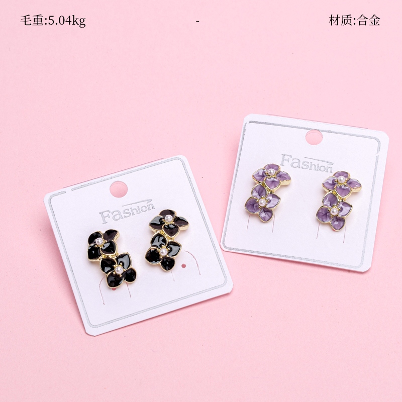 Los Dos Pendientes de Gota de Aceite de Camellia 2