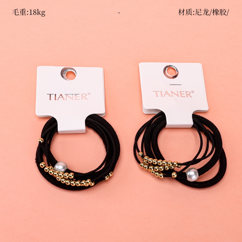 Tres Bolas de Oro Negro Combinación de Banda de Goma 2