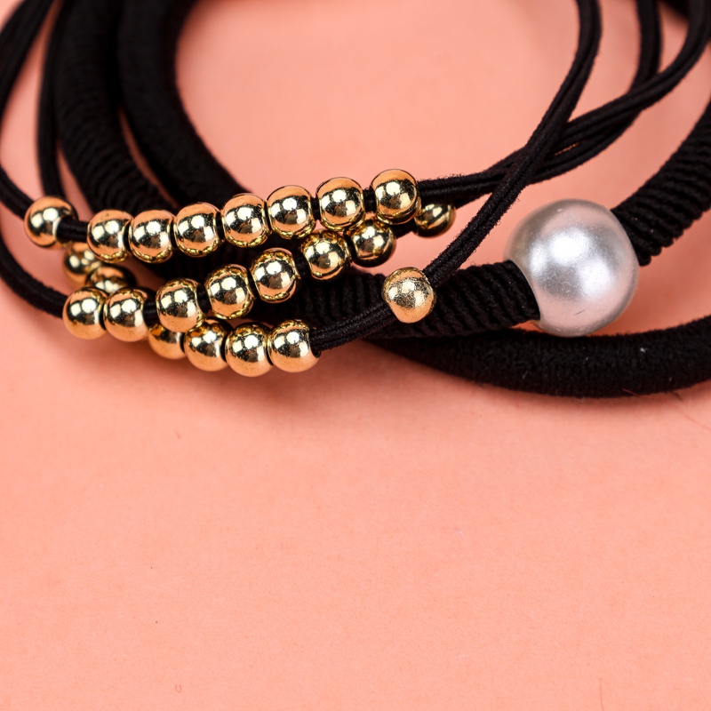 Tres Bolas de Oro Negro Combinación de Banda de Goma 3