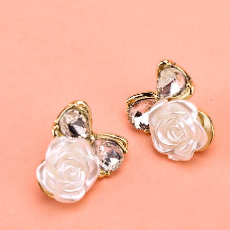 Long Zircon Bow-tie Flower Stud Pendientes 4