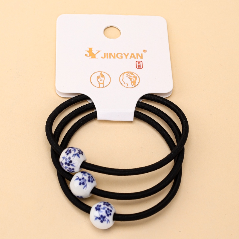 Tres Cuentas de Porcelana Azul y Blanco Bandas de Goma Negra 4